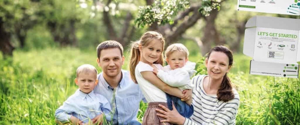 Big family with three little children. Parents and kids in spring garden. Mother, father, preschooler girl, toddler boy and baby.